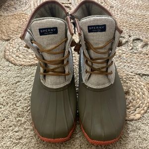 Sperry boots. Cream and tan color with coral on the bottom. Size 11.